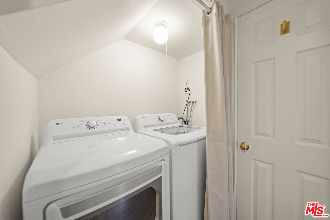 21545 Dome Trail Topanga, CA 90290 - Photo 19 of 23 a utility room with dryer and washer