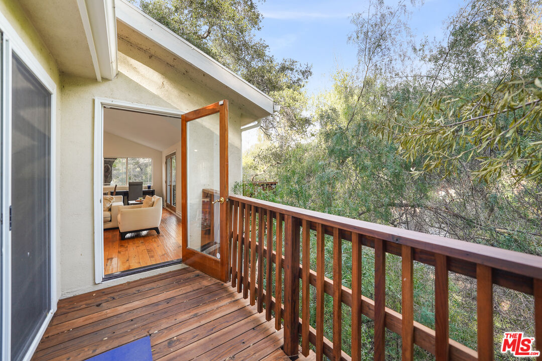 21545 Dome Trail Topanga, CA 90290 - Photo 20 of 23 a view of a balcony with wooden floor