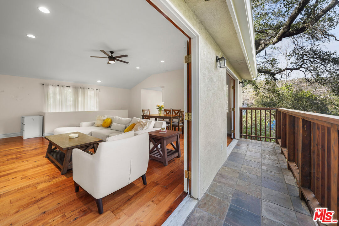 21545 Dome Trail Topanga, CA 90290 - Photo 4 of 23 a view of kitchen with furniture and wooden floor