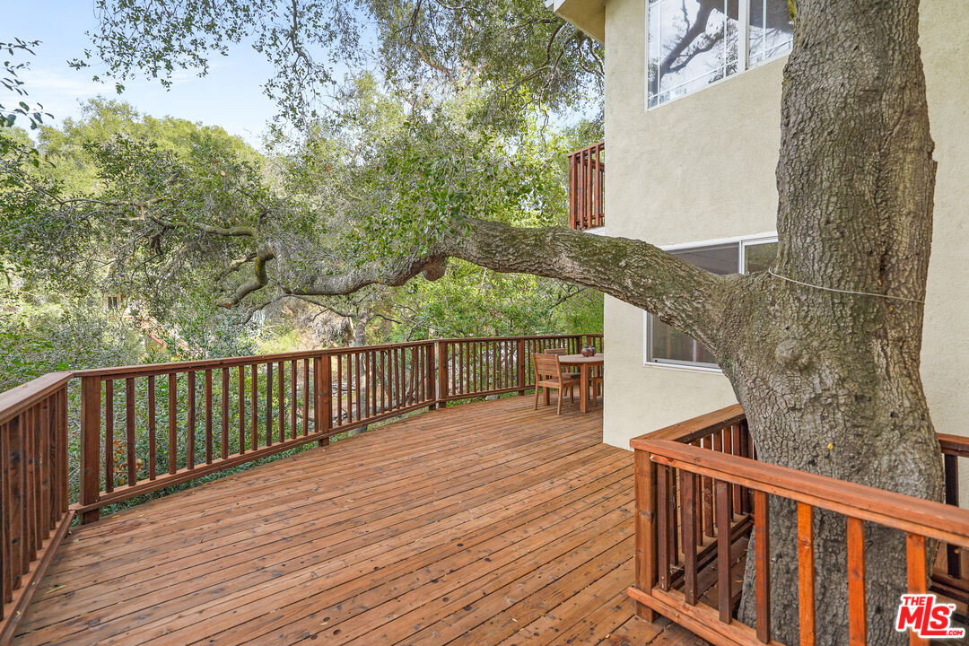 21545 Dome Trail Topanga, CA 90290 - Photo 10 of 23 a view of deck with wooden floor and fence