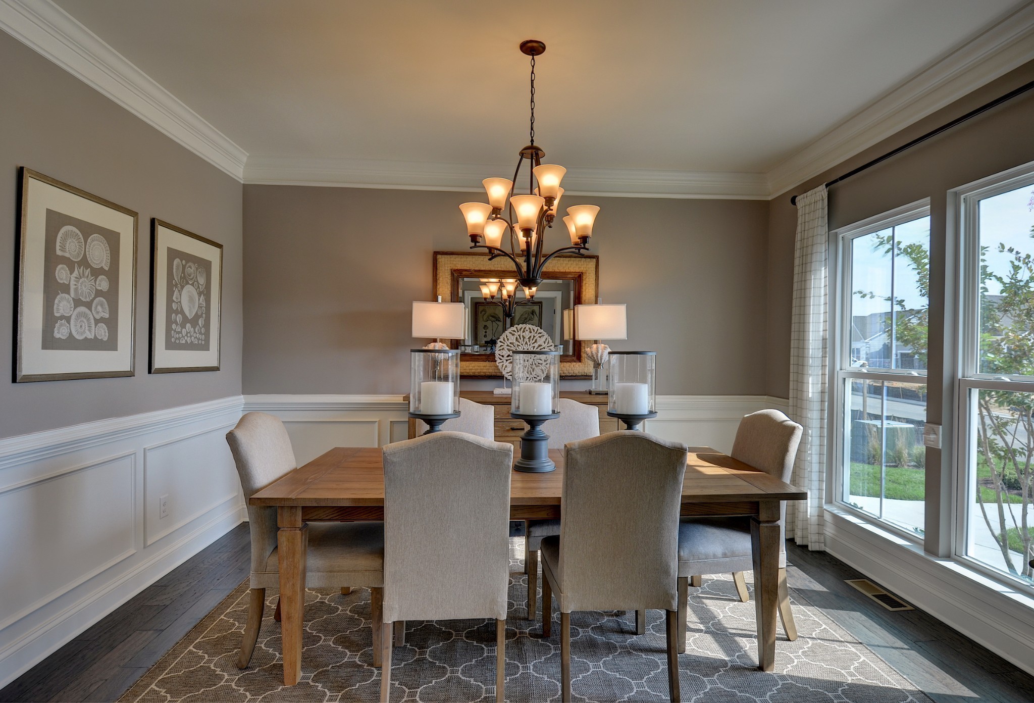 4020 Oglethorpe Drive Franklin, TN 37064 - Photo 6 of 14 a dining room with furniture a chandelier and a rug