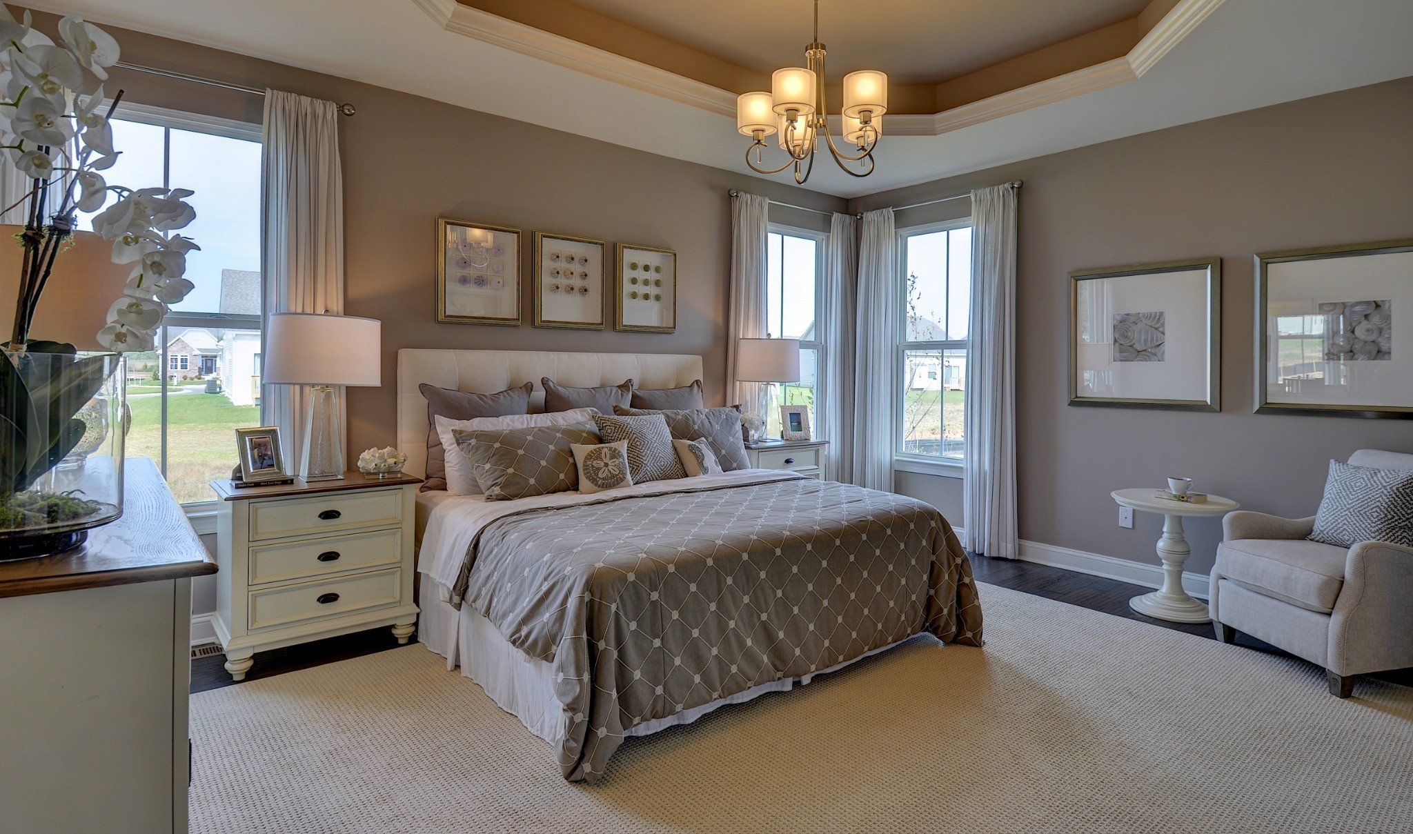 4020 Oglethorpe Drive Franklin, TN 37064 - Photo 8 of 14 a spacious bedroom with a bed and a chandelier