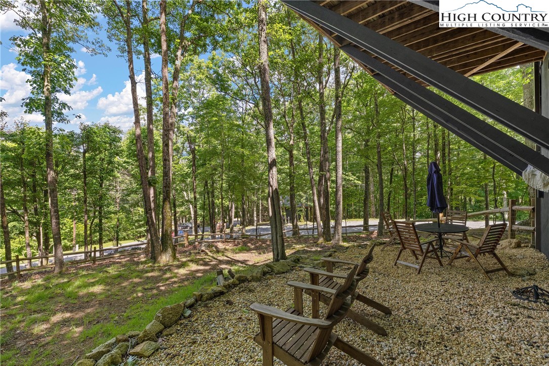 139 Club House Road Beech Mountain, NC 28604 - Photo 41 of 44 a view of chairs and tables in the patio