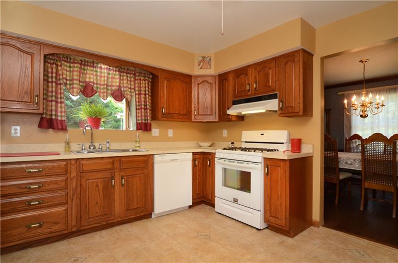 61 Swallow Hill Road Carnegie, PA 15106 - Photo 5 of 15 Kitchen leads to the dining room