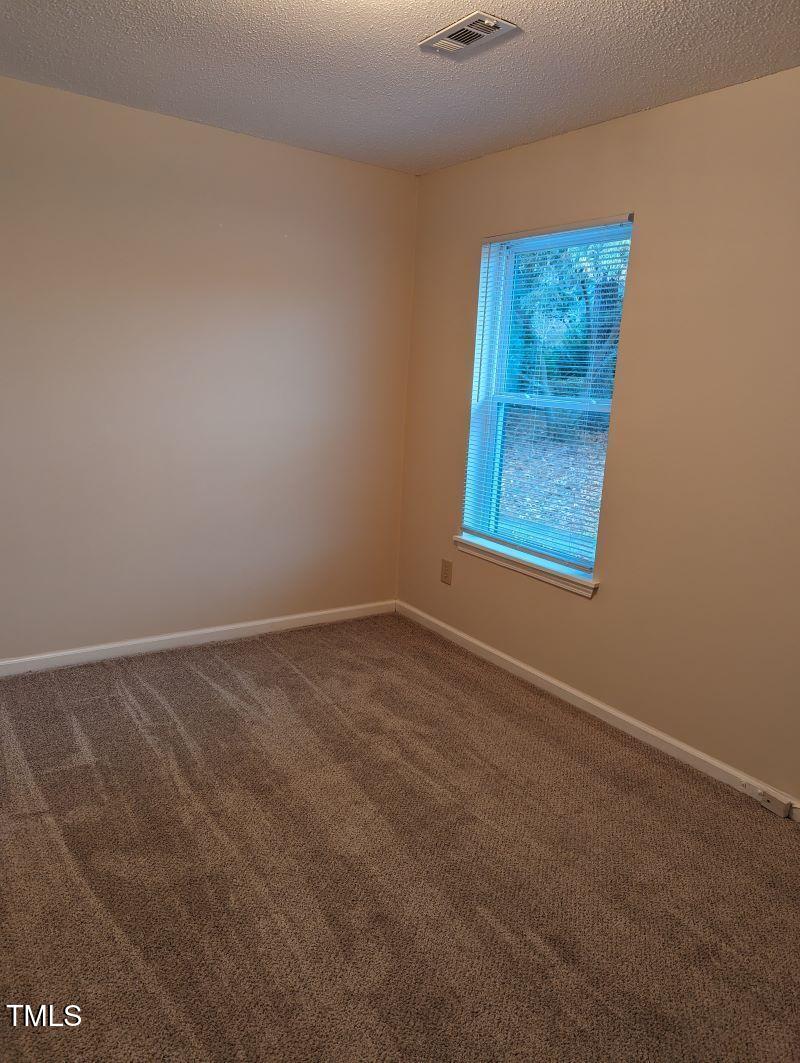2616 Stewart Drive, Unit C Raleigh, NC 27603 - Photo 15 of 25 Master Bedroom Front 2