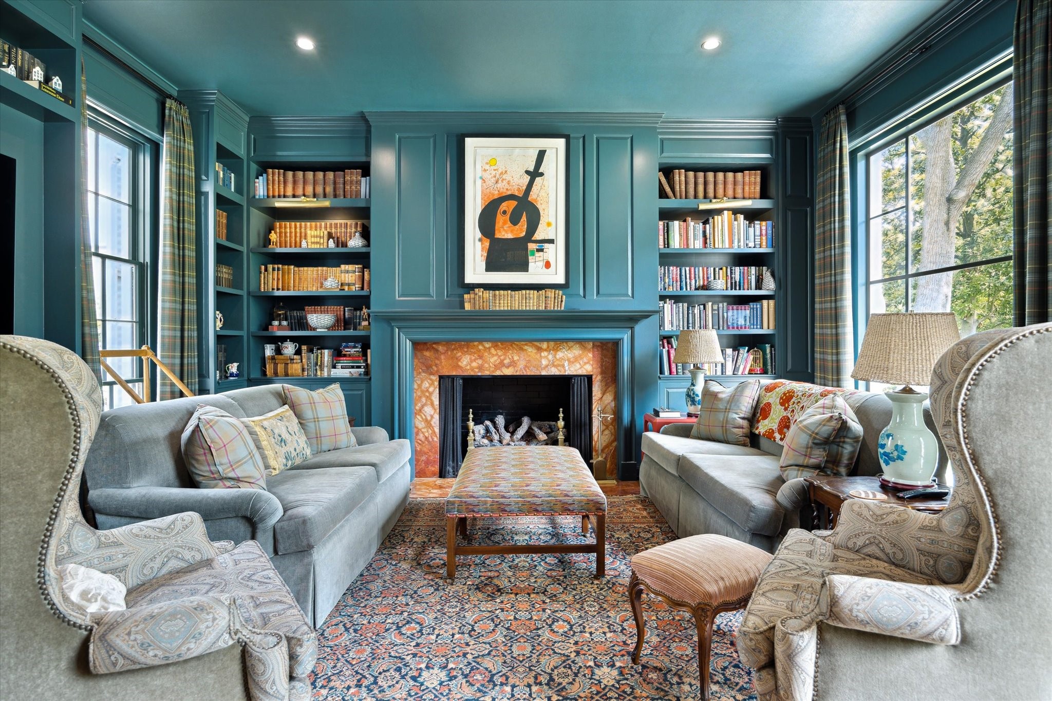 4019 Inverness Drive Houston, TX 77019 - Photo 16 of 49 a living room with furniture fireplace and a large window