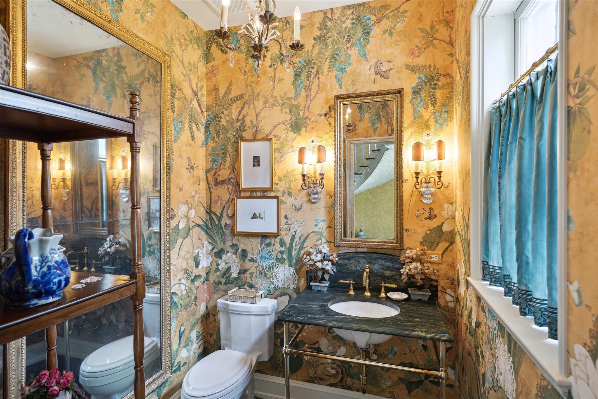 4019 Inverness Drive Houston, TX 77019 - Photo 20 of 49 a bathroom with a toilet sink and mirror