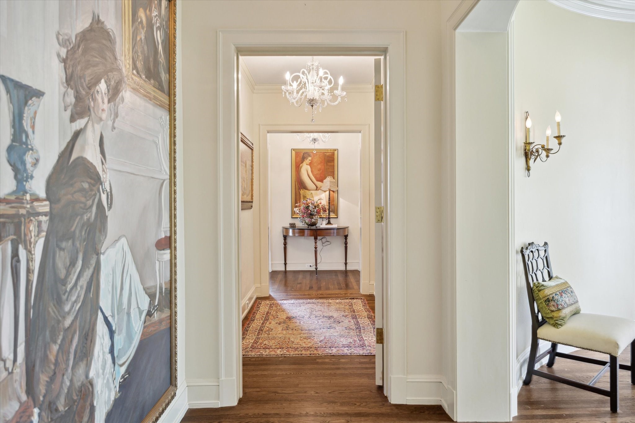 4019 Inverness Drive Houston, TX 77019 - Photo 22 of 49 a view of a hallway with wooden floor and a dining room view