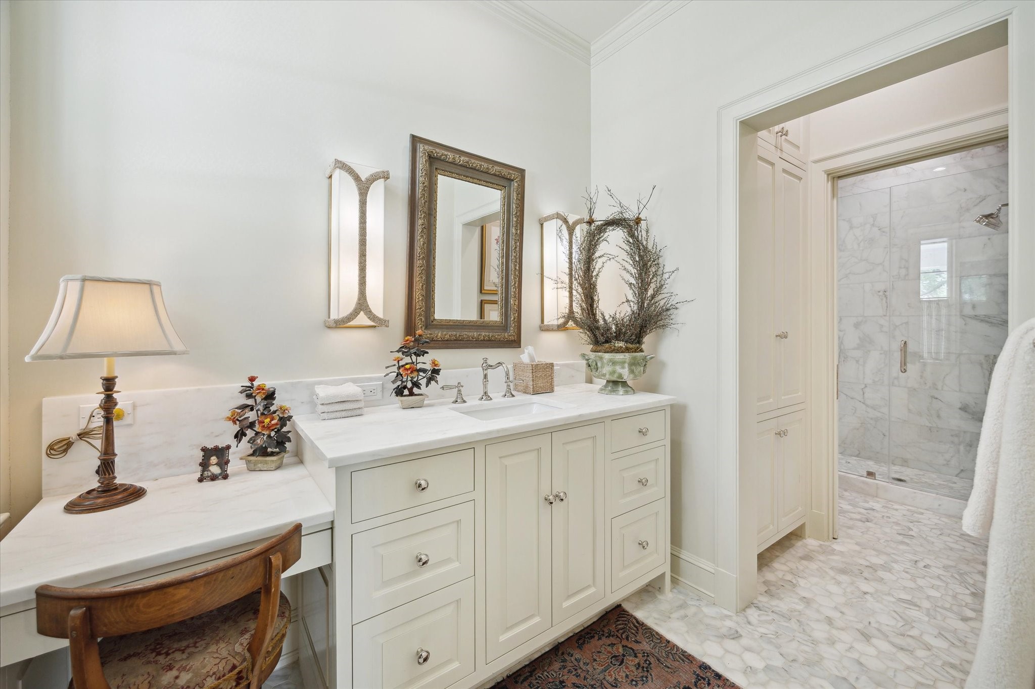 4019 Inverness Drive Houston, TX 77019 - Photo 28 of 49 a en suite bathroom with a double vanity sink a mirror and shower