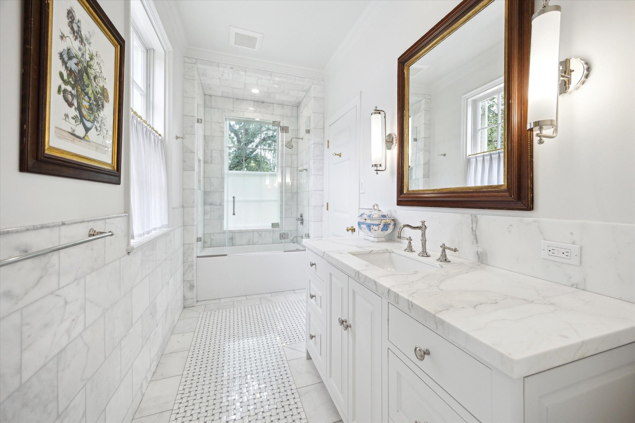 4019 Inverness Drive Houston, TX 77019 - Photo 30 of 49 a bathroom with a sink and a mirror