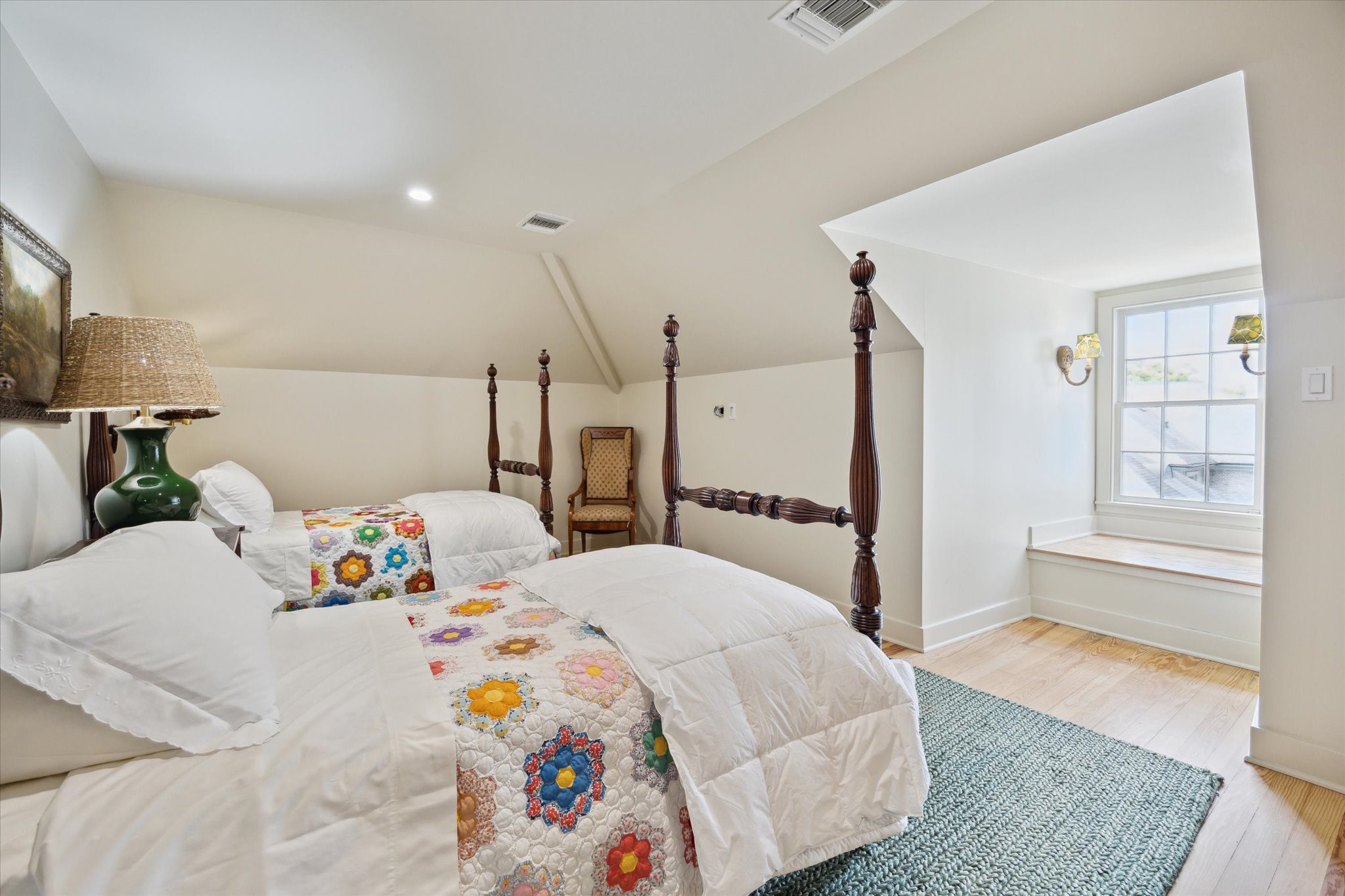 4019 Inverness Drive Houston, TX 77019 - Photo 33 of 49 a bedroom with a bed and a window