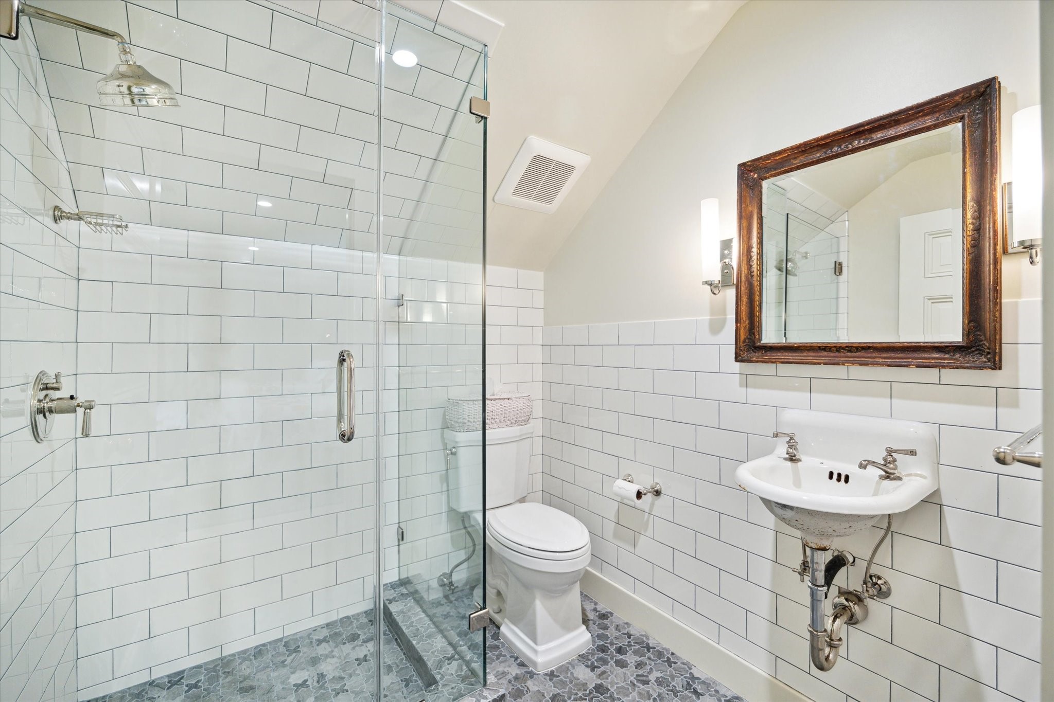 4019 Inverness Drive Houston, TX 77019 - Photo 34 of 49 a bathroom with a toilet sink and mirror