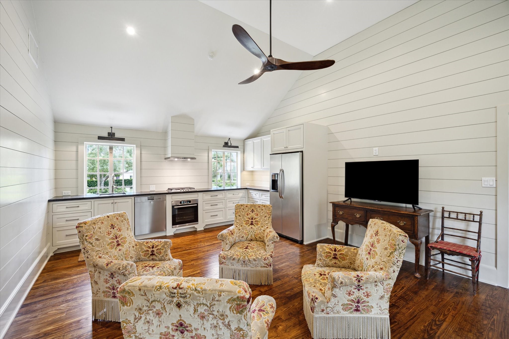 4019 Inverness Drive Houston, TX 77019 - Photo 37 of 49 a living room with furniture flat screen tv and a fireplace