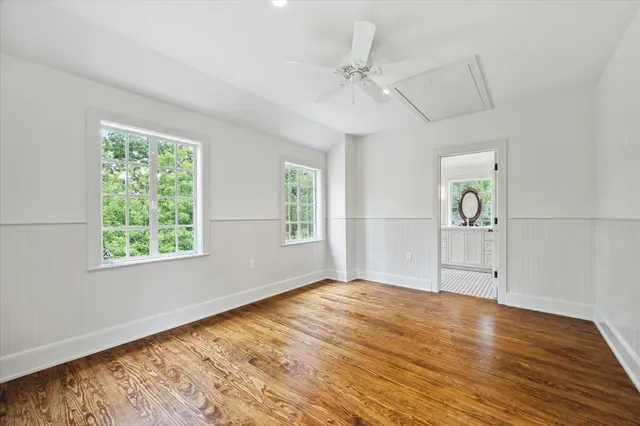 a view of a house with backyard sitting area and garden