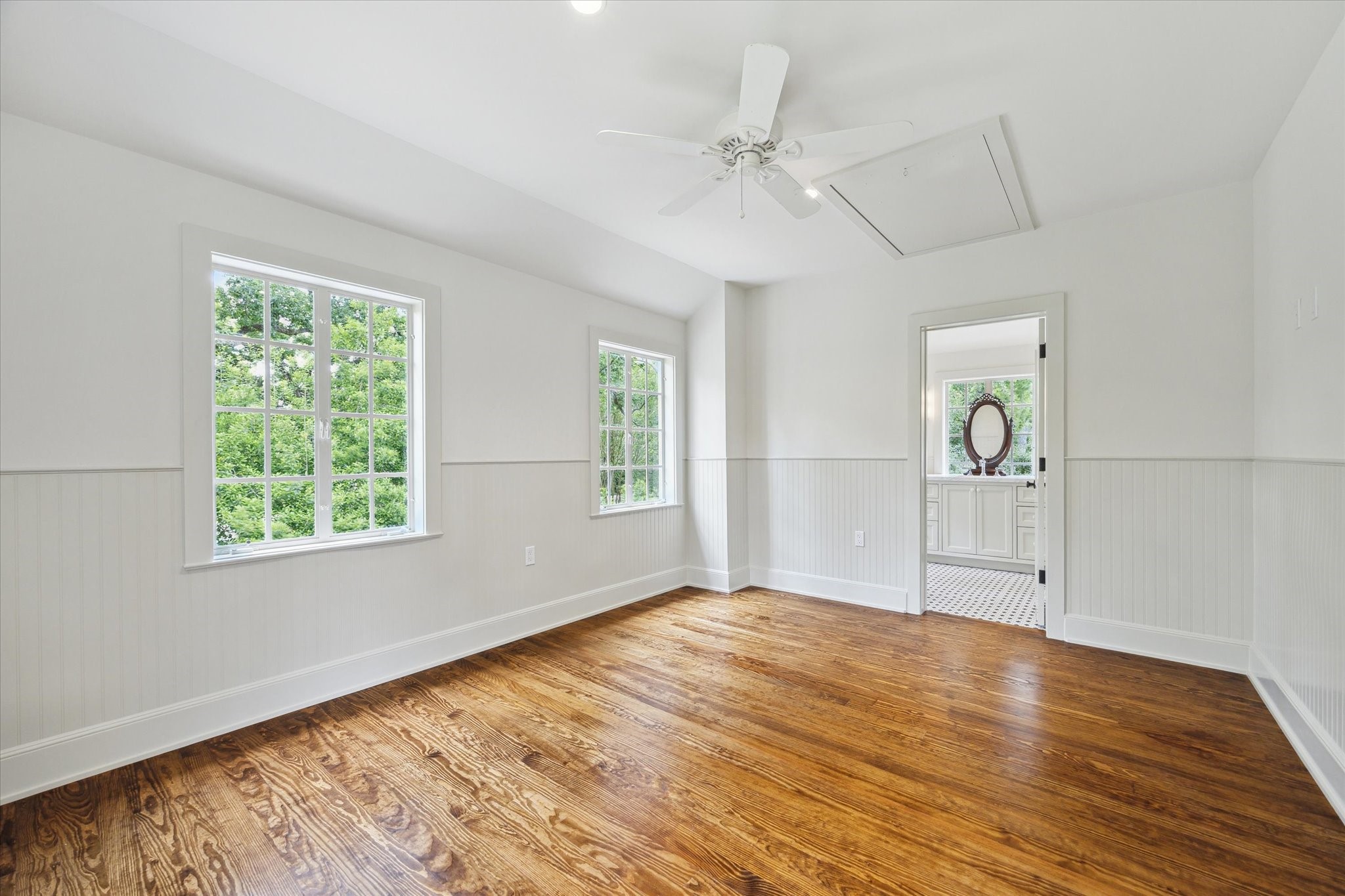 4019 Inverness Drive Houston, TX 77019 - Photo 40 of 49 a view of empty room with wooden floor and fan