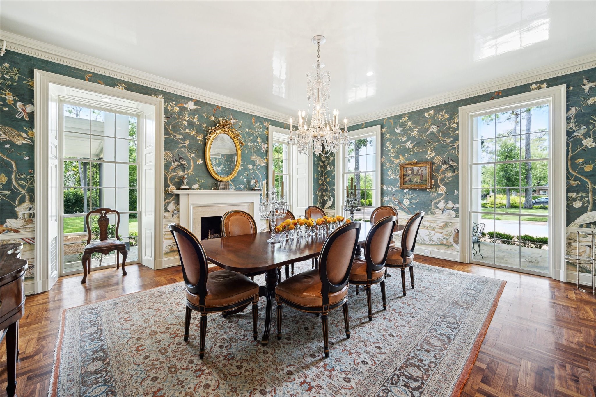 4019 Inverness Drive Houston, TX 77019 - Photo 9 of 49 a dining room with furniture a chandelier and wooden floor