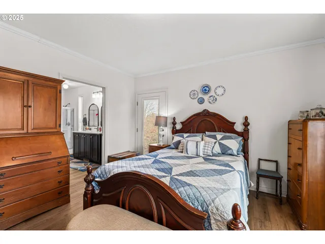 a bedroom with a bed and a cabinets