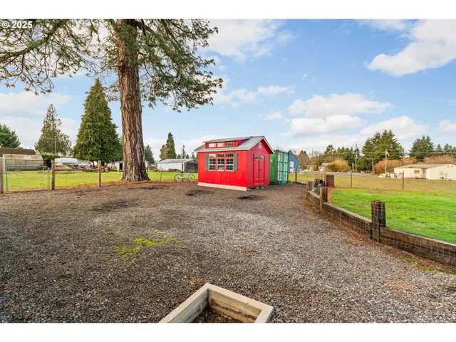 a view of outdoor space with playground and green space