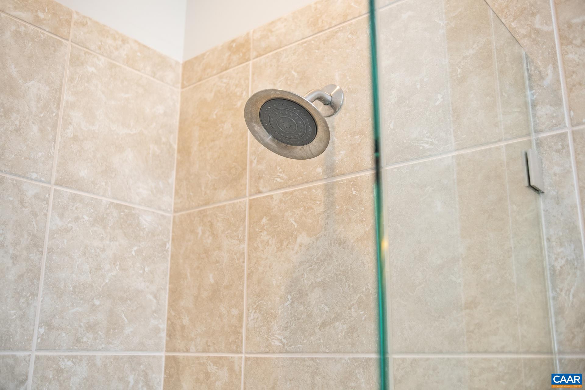 2032 Avinity Loop Charlottesville, VA 22902 - Photo 17 of 35 a bathroom with a shower and a sink
