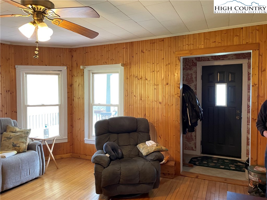 2136 Little Laurel Road Creston, NC 28615 - Photo 30 of 44 a living room with furniture and a window