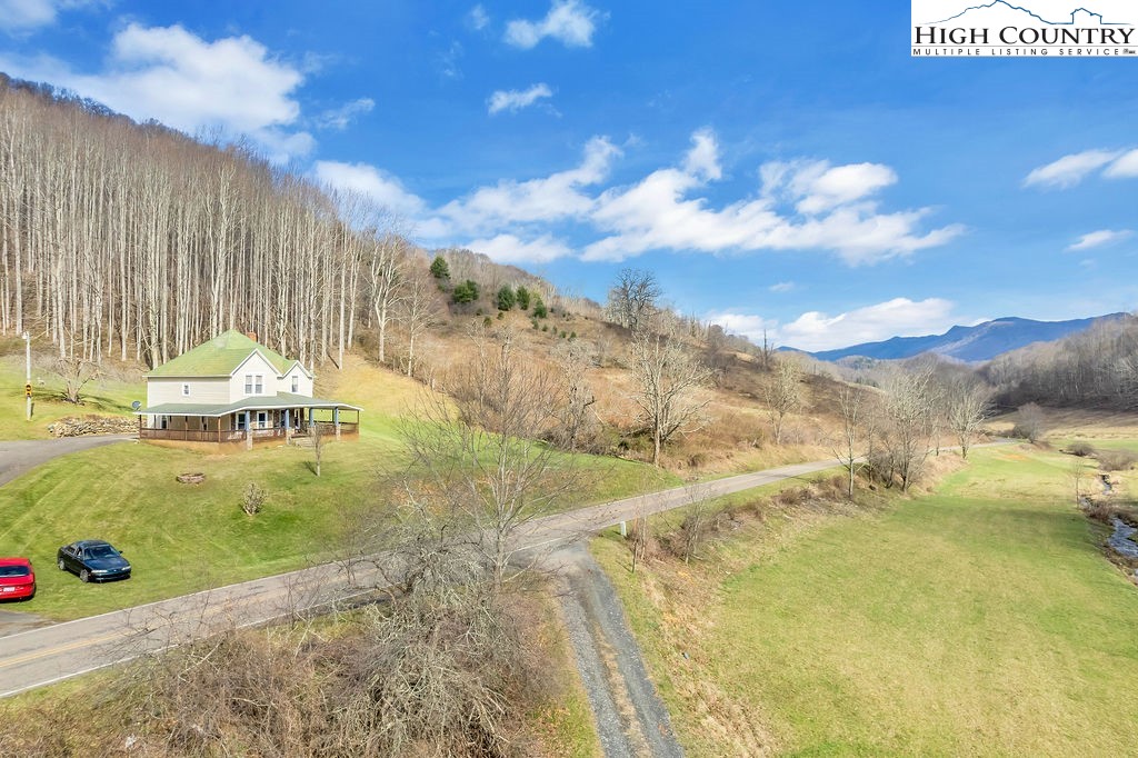 2136 Little Laurel Road Creston, NC 28615 - Photo 7 of 44 a view of an outdoor space and lakeside
