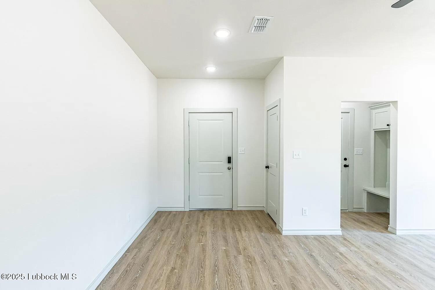 2113 20th Street, Unit A & B Lubbock, TX 79411 - Photo 12 of 31 a view of a hallway with wooden floor