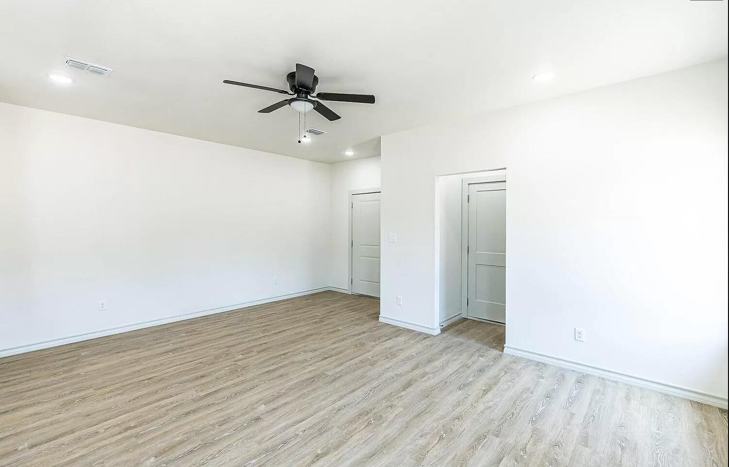 2113 20th Street, Unit A & B Lubbock, TX 79411 - Photo 27 of 31 wooden floor in an empty room