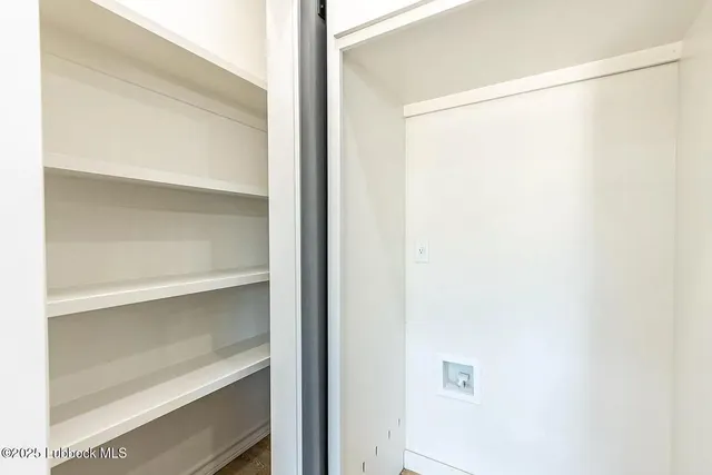 a view of a room with a door