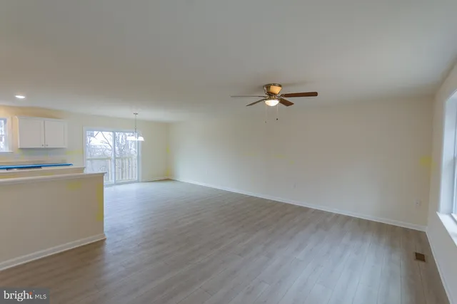 a view of a livingroom and window