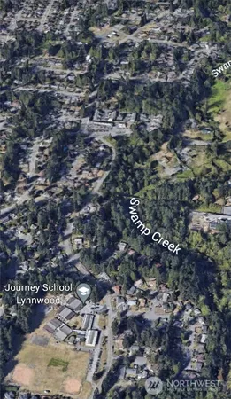 a view of a road from a backyard