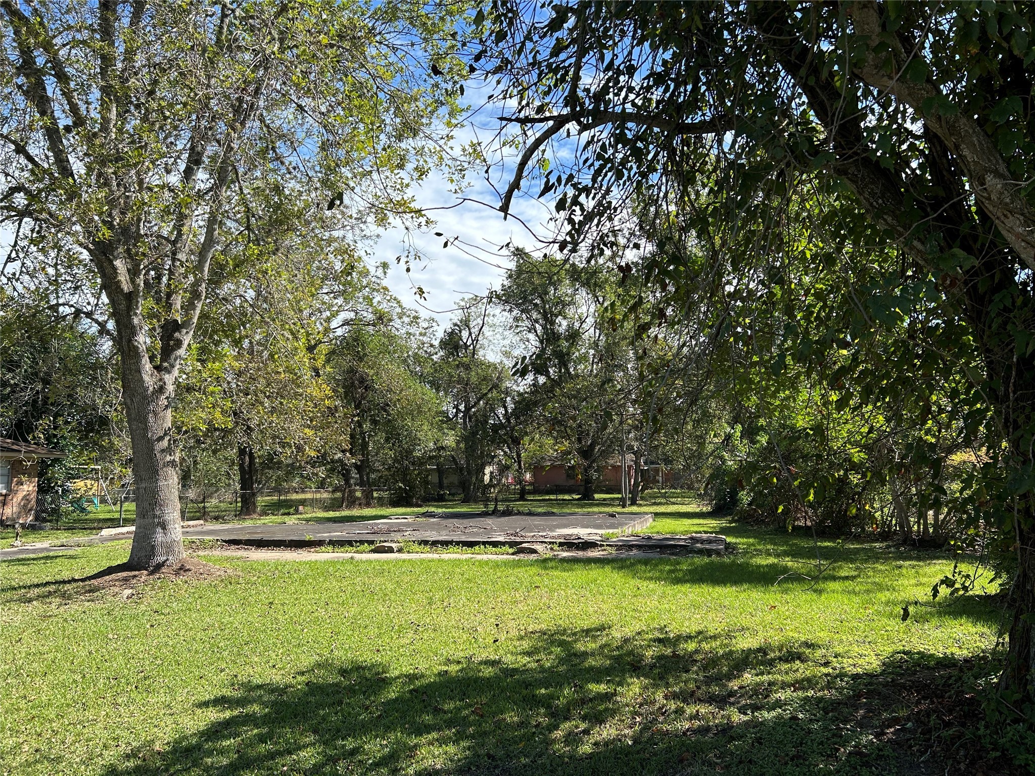 a view of swimming pool with a yard