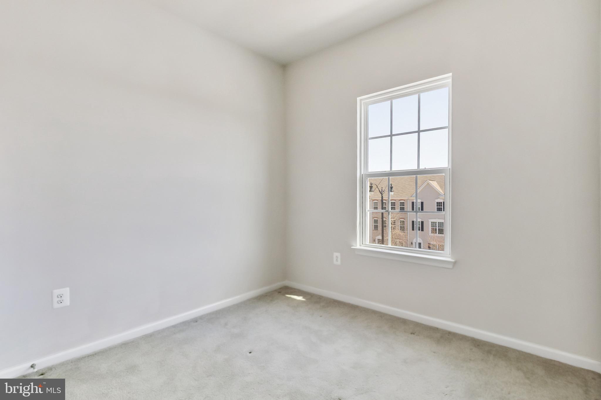 5329 Woodyard Road Upper Marlboro, MD 20772 - Photo 16 of 25 an empty room with a window