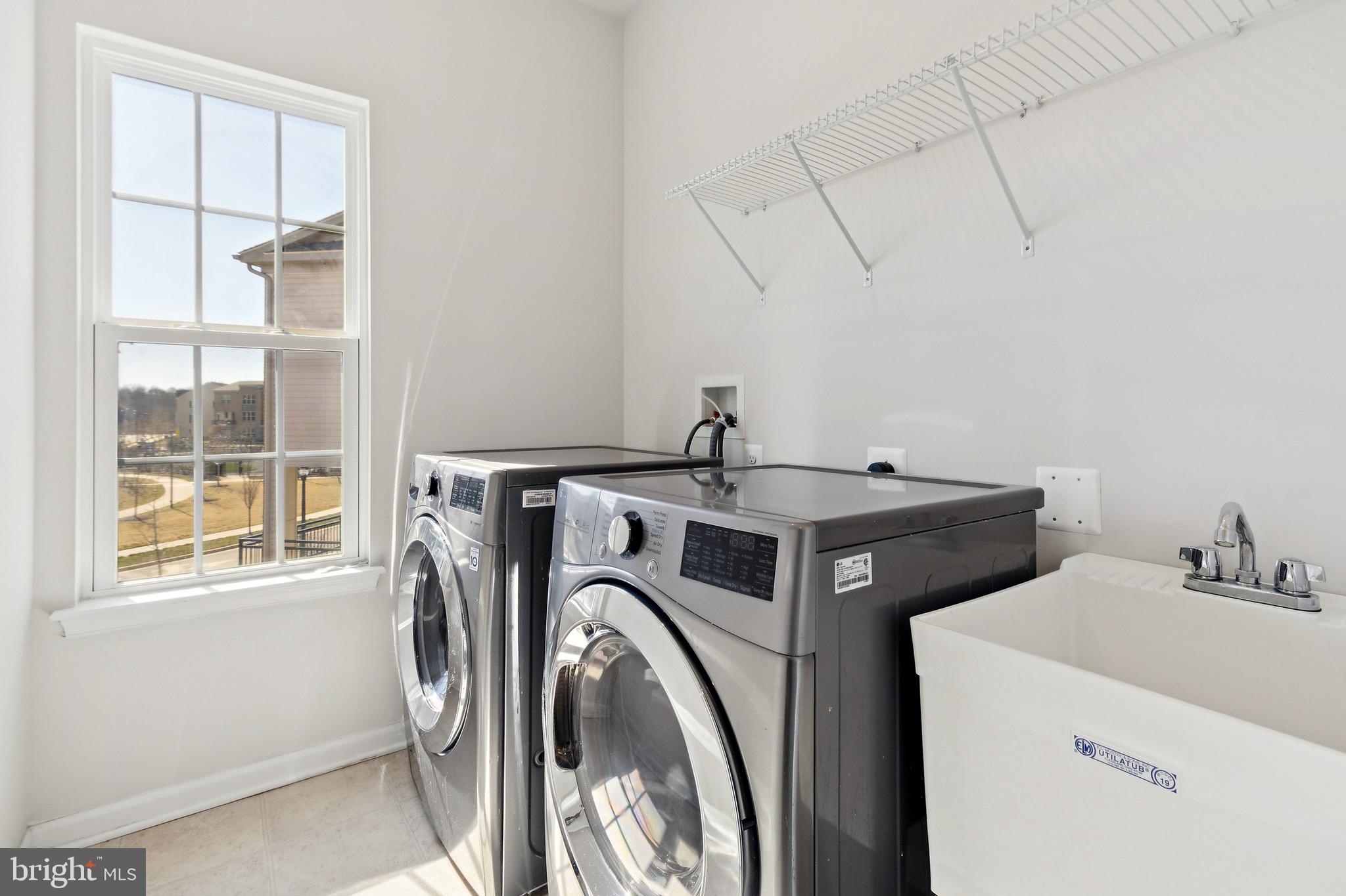 5329 Woodyard Road Upper Marlboro, MD 20772 - Photo 18 of 25 a utility room with dryer and washer