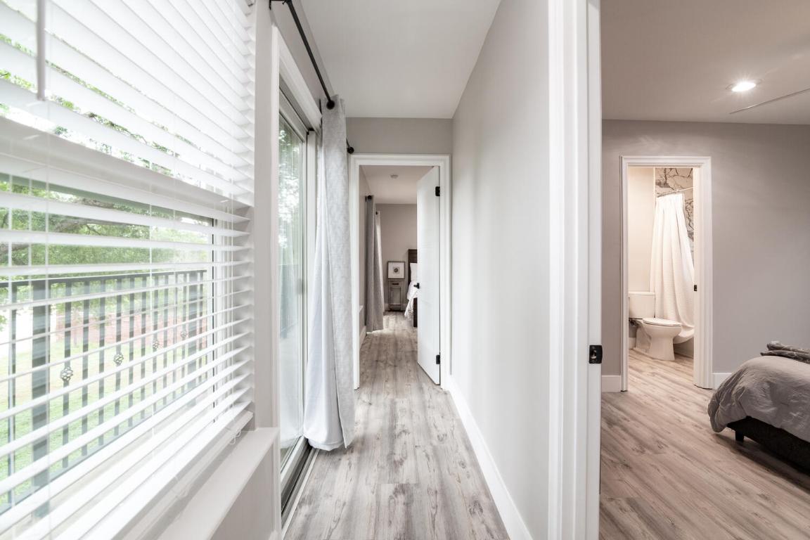7905-7907 Tiffany Drive Austin, TX 78749 - Photo 19 of 37 a view of a bedroom from a hallway
