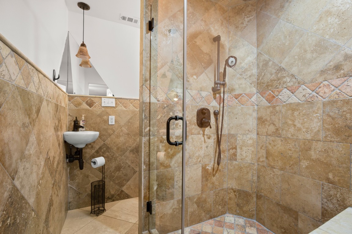7905-7907 Tiffany Drive Austin, TX 78749 - Photo 34 of 37 a bathroom with a shower