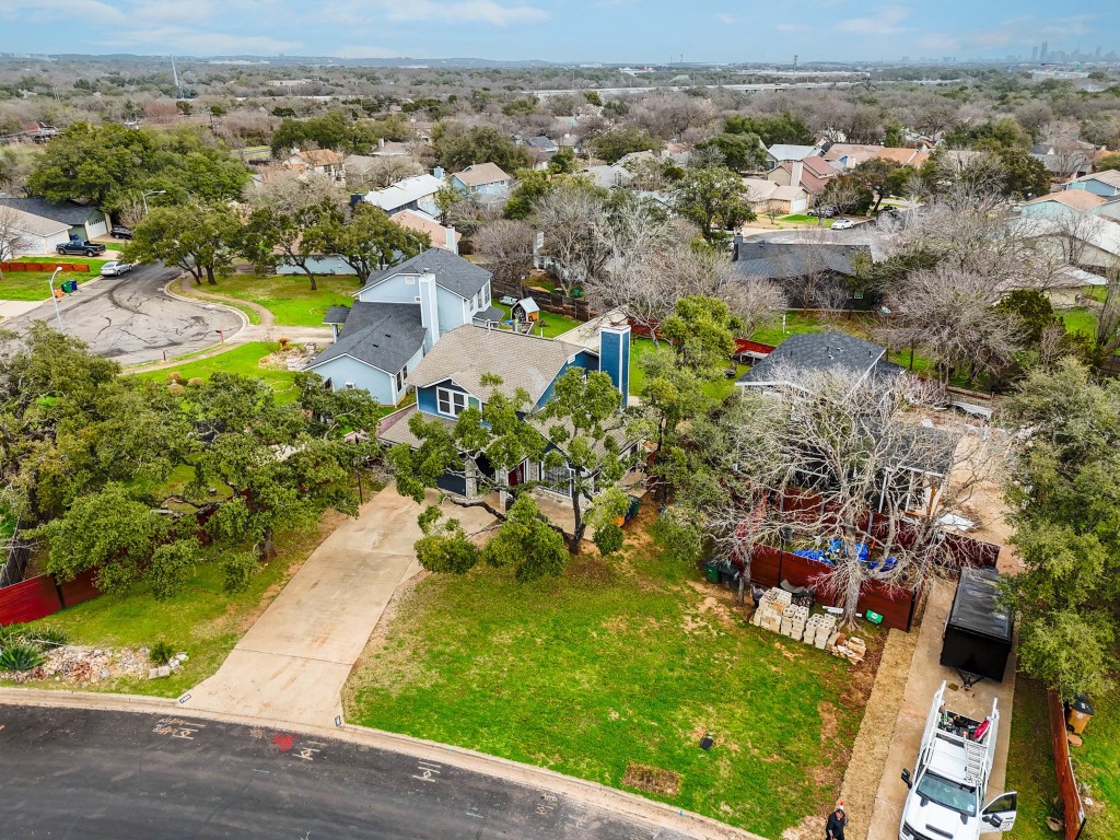 7905-7907 Tiffany Drive Austin, TX 78749 - Photo 4 of 37 an aerial view of residential houses with outdoor space and swimming pool