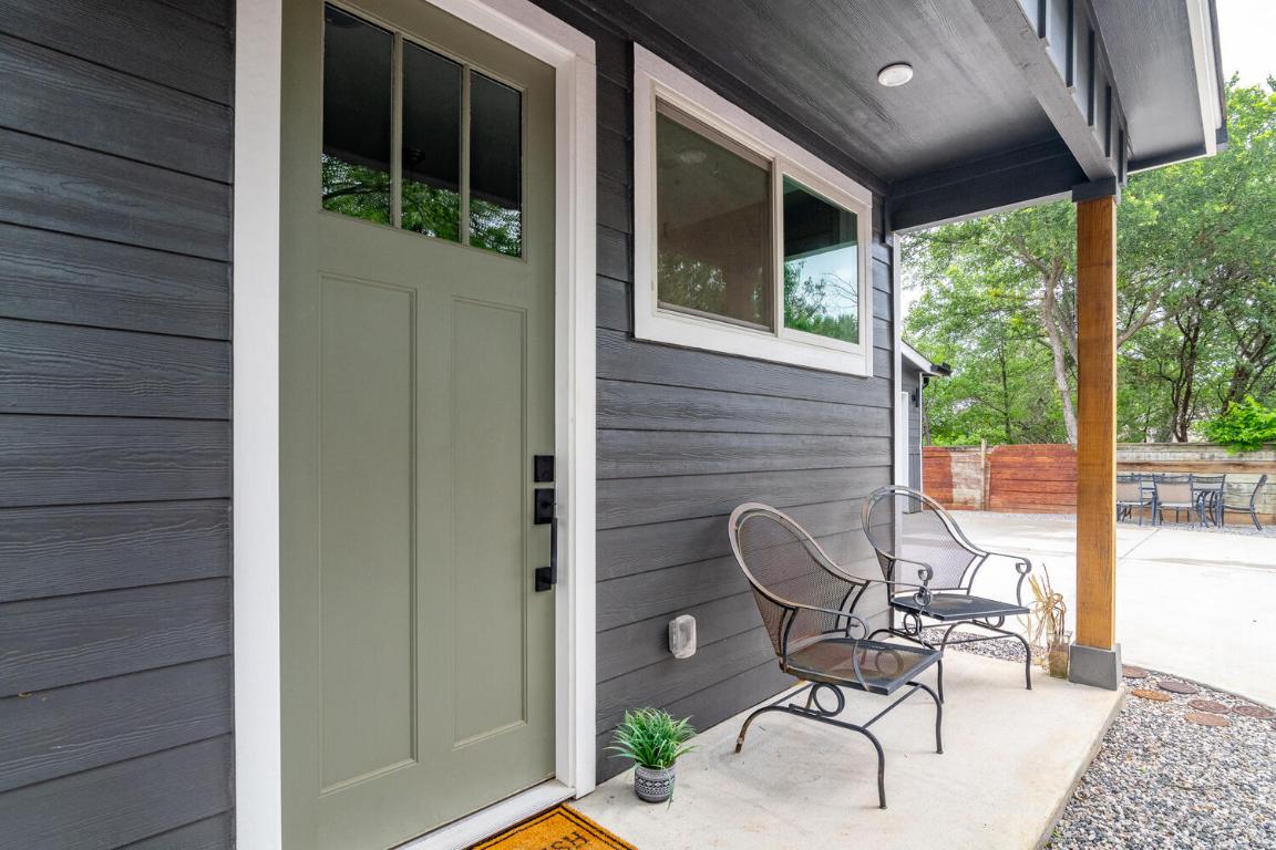 7905-7907 Tiffany Drive Austin, TX 78749 - Photo 8 of 37 a view of a chair and table in backyard front of house