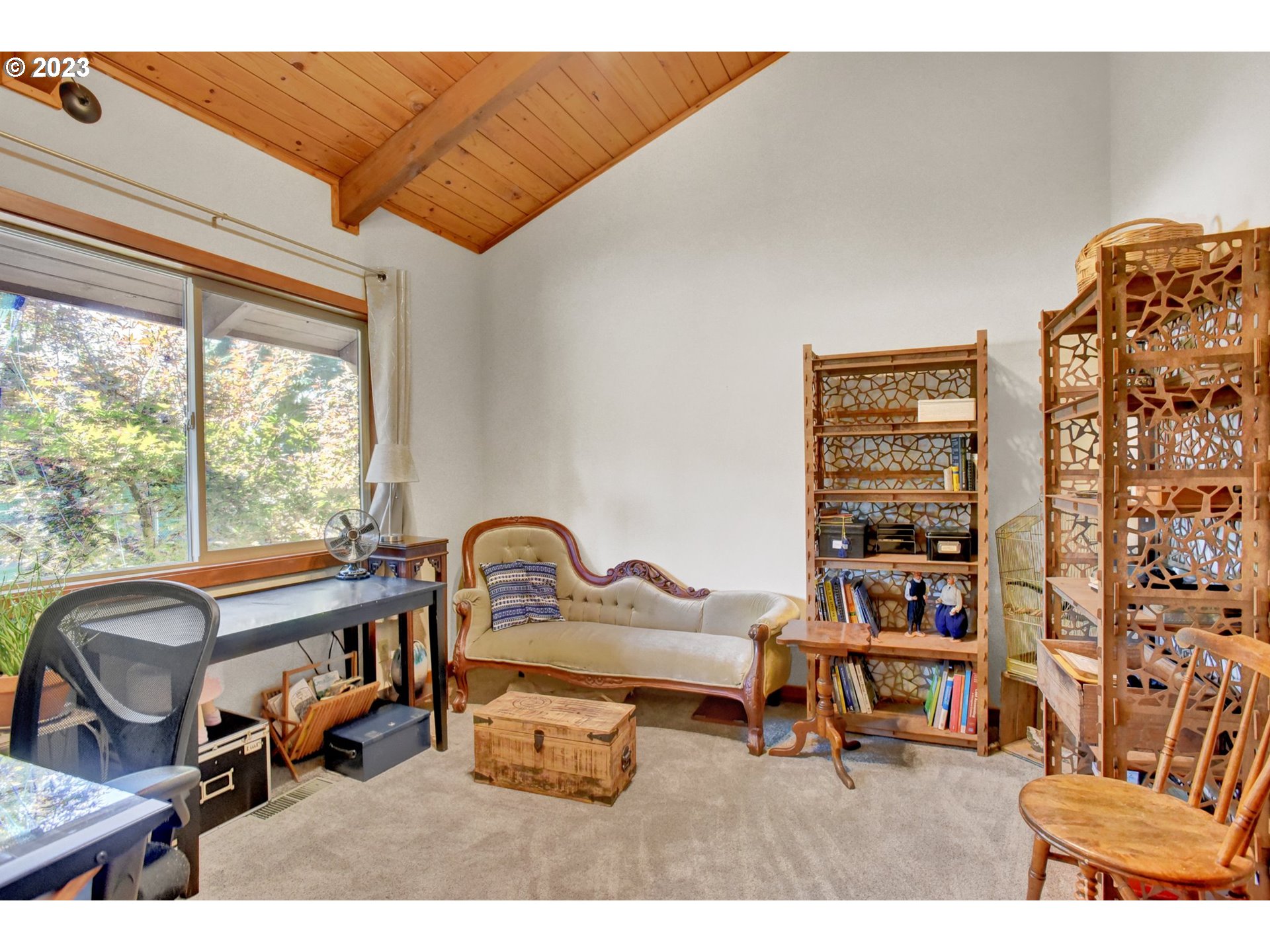 43011 Southeast Keisecker Road Sandy, OR 97055 - Photo 13 of 48 a living room with furniture a flat screen tv and a window