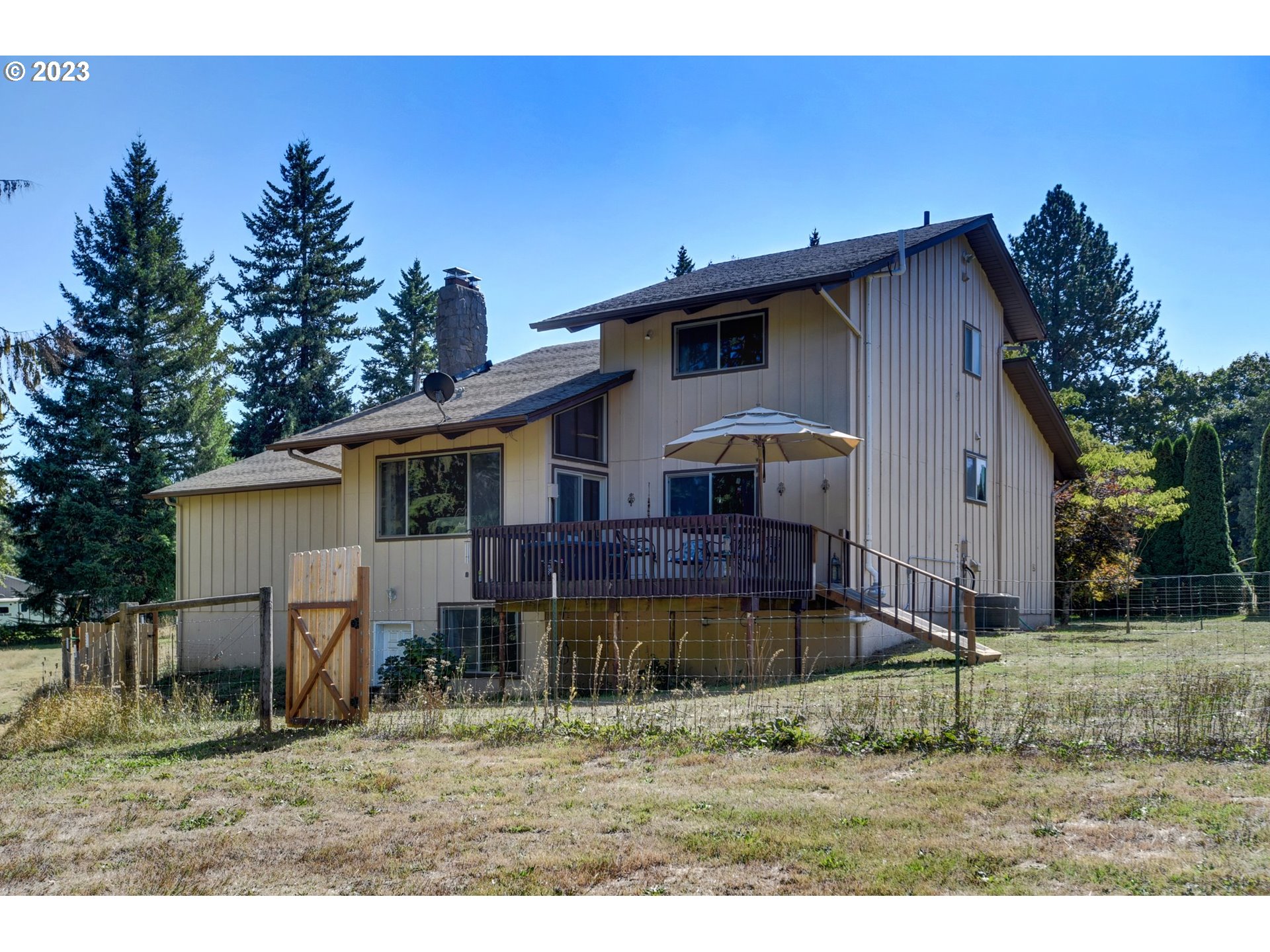 43011 Southeast Keisecker Road Sandy, OR 97055 - Photo 34 of 48 a view of a house with backyard and trees