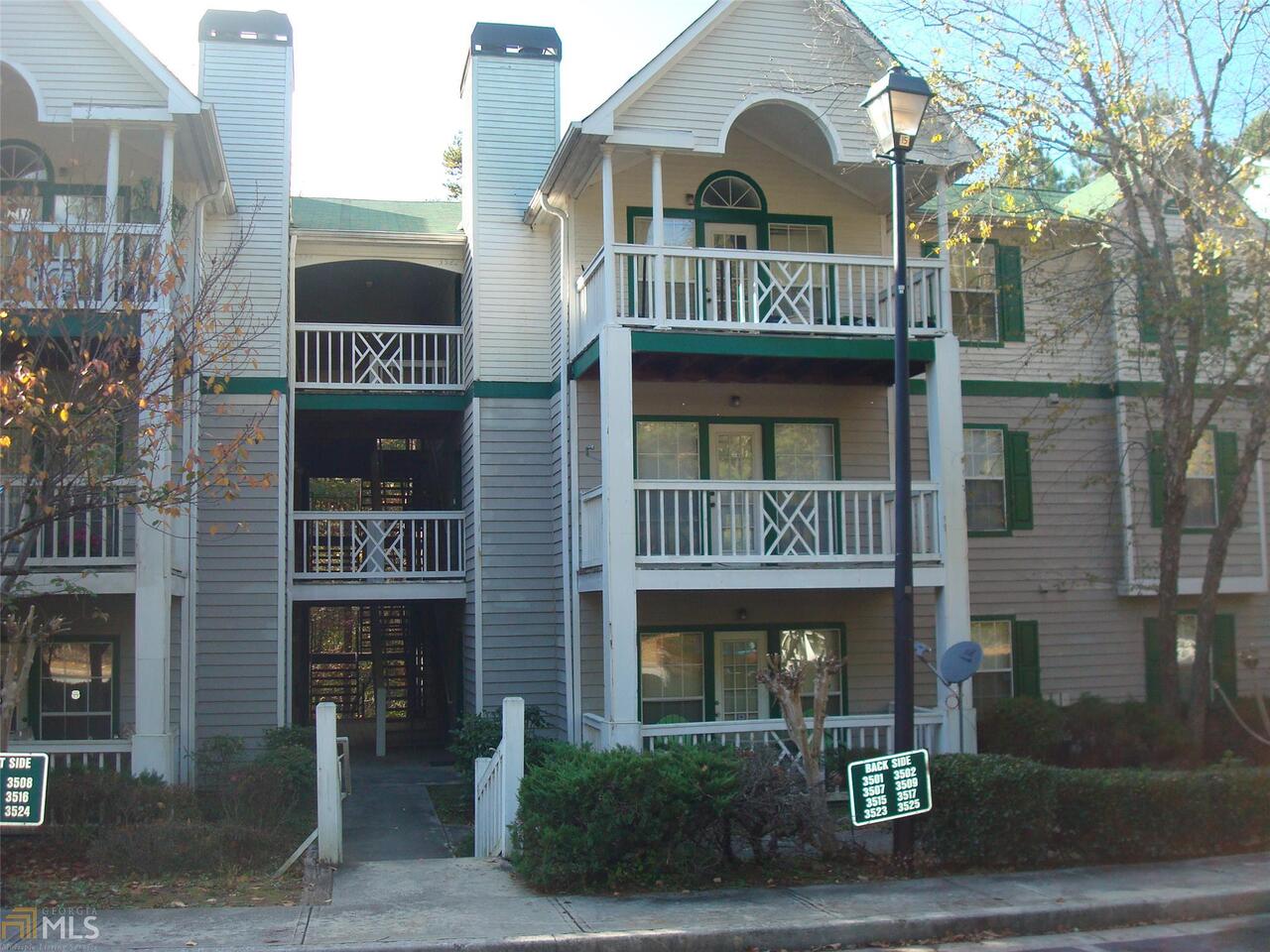 3515 Shepherds Path, Unit 44 Decatur, GA 30034 - Photo 1 of 1 a front view of a residential apartment building with a yard