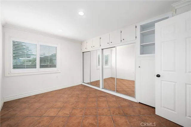 a bathroom with a sink a mirror and a shower curtain