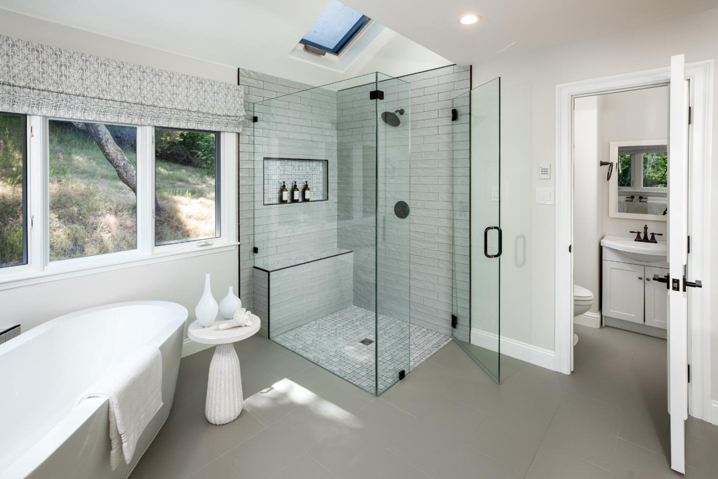 345 Harcross Road Woodside, CA 94062 - Photo 21 of 37 a bathroom with a shower a toilet and sink