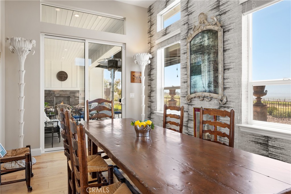 1650 Eucalyptus Road Nipomo, CA 93444 - Photo 17 of 60 a dining room with furniture and wooden floor