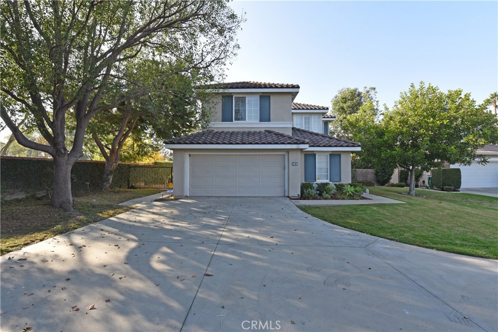 24 Silveroak Irvine, CA 92620 - Photo 1 of 64 a front view of house with yard and trees