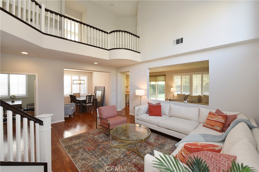 24 Silveroak Irvine, CA 92620 - Photo 13 of 64 a living room with furniture or couch and a table