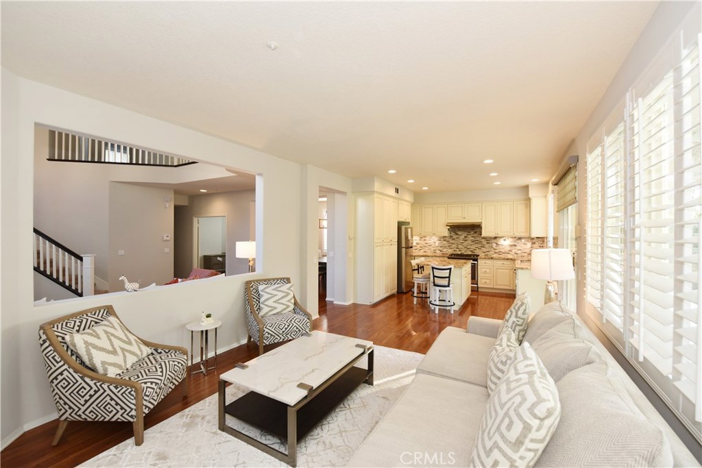 24 Silveroak Irvine, CA 92620 - Photo 14 of 64 a living room with furniture and a large window