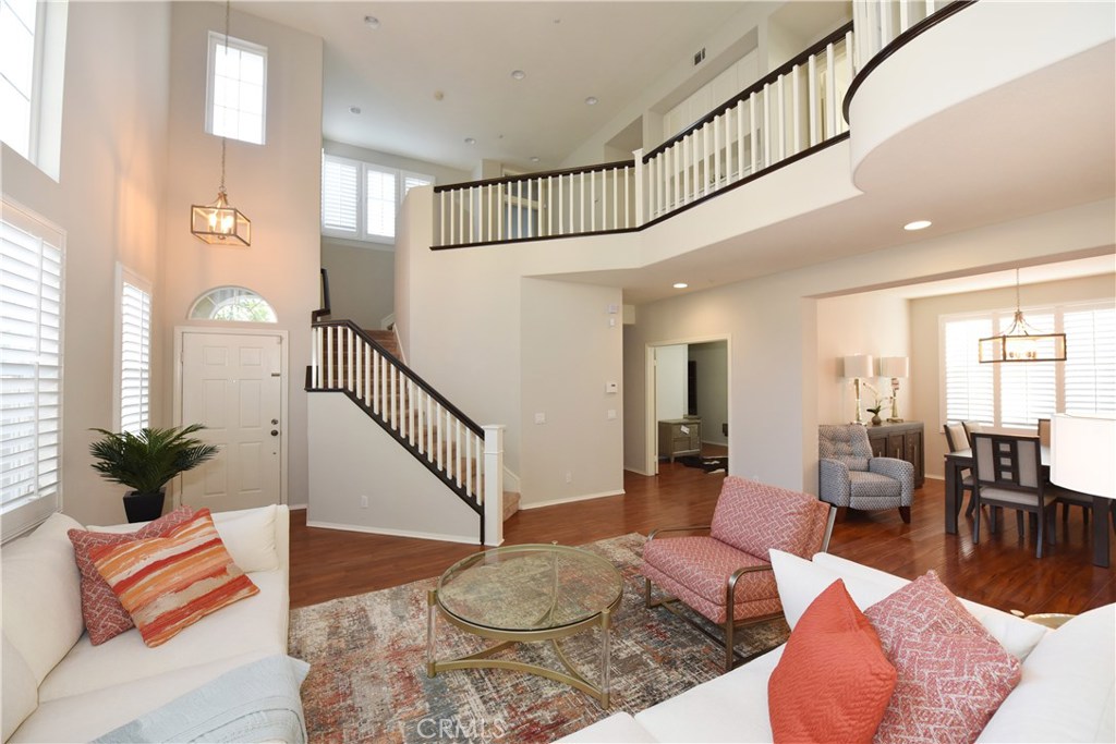 24 Silveroak Irvine, CA 92620 - Photo 18 of 64 a living room with furniture or couch and a potted plant