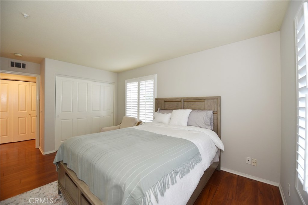 24 Silveroak Irvine, CA 92620 - Photo 26 of 64 a bedroom with a bed and a window