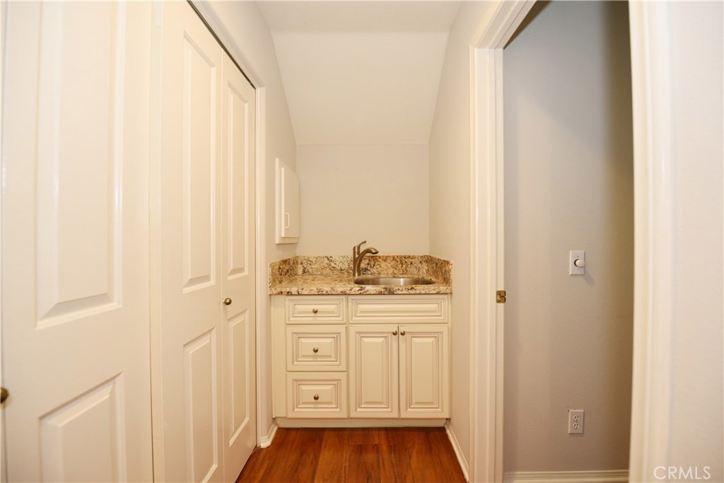24 Silveroak Irvine, CA 92620 - Photo 27 of 64 a bathroom with a sink and a mirror