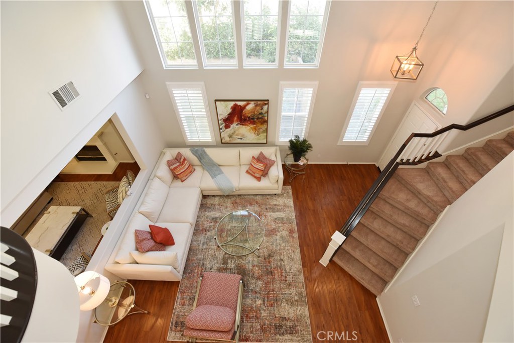 24 Silveroak Irvine, CA 92620 - Photo 38 of 64 a living room with furniture and a fireplace